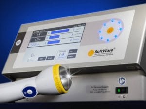 SoftWave Tissue Regenerative Therapy device with focused acoustic wave applicator, used in non-surgical treatment to support tissue healing and pain reduction.